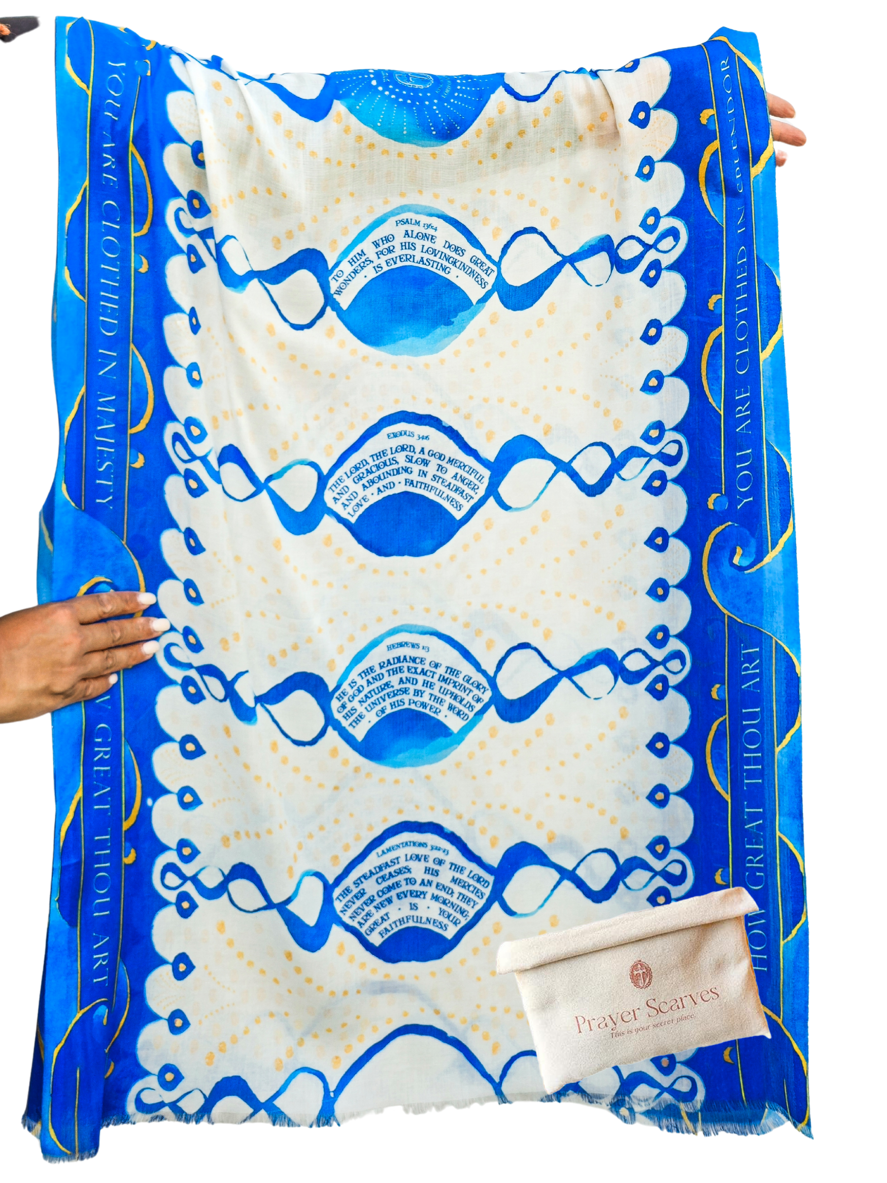 How Great Prayer Scarf by Prayer Scarves® held fully open, showing the full cream and deep blue layout with repeating circular scripture sections, flowing calligraphic motifs, dotted accents, and a beige Prayer Scarves storage pouch placed at the corner.