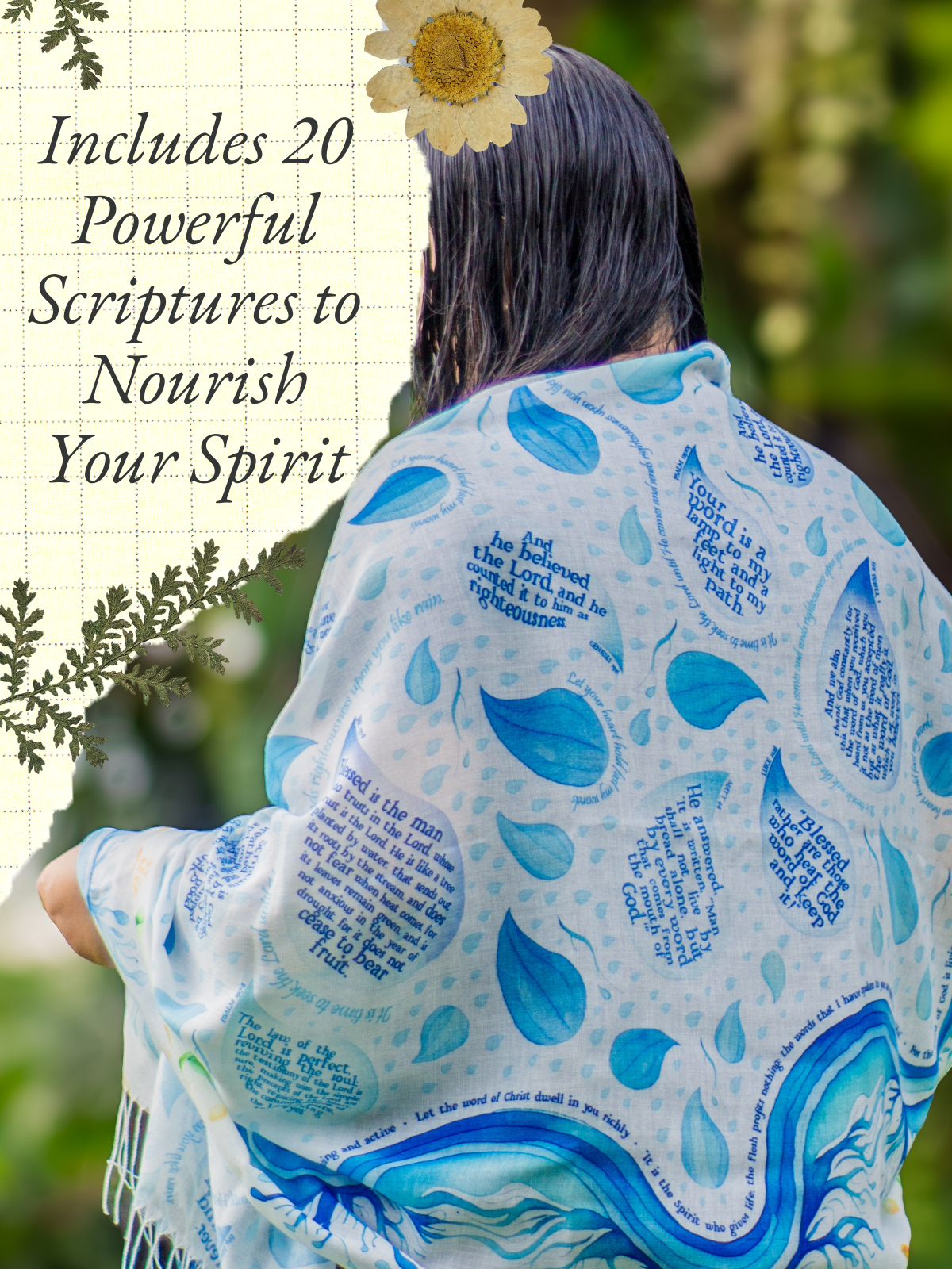Seed of Life prayer scarf by Prayer Scarves® worn by a model indoors, featuring flowing blue water-inspired illustrations, raindrop motifs, visible Psalm scripture text, and a tree with a cross integrated into the design.
