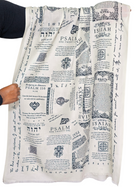 Cotton protection prayer scarf by Prayer Scarves® in ivory, shown held open to display the full Scripture layout, made from organic cotton and featuring passages about God’s protection